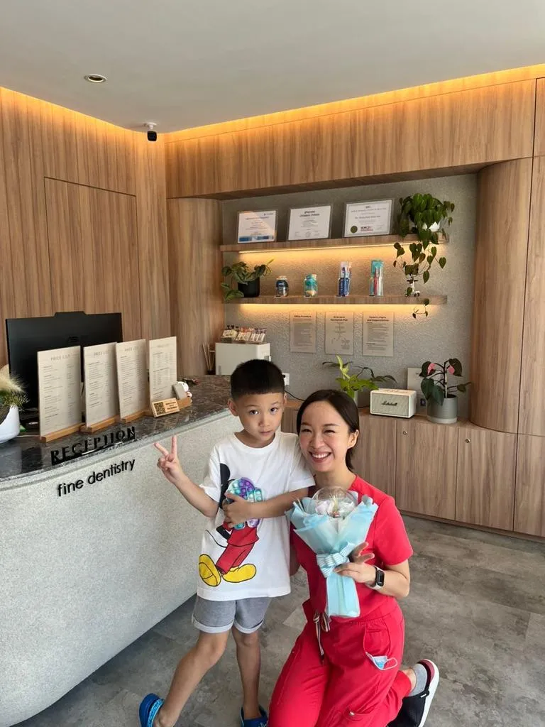 Child receiving gentle dental care at Fine Dentistry