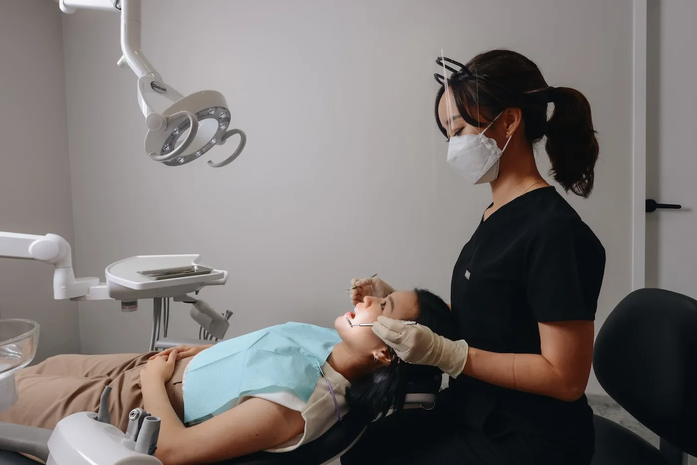 Smiling patient checking shade