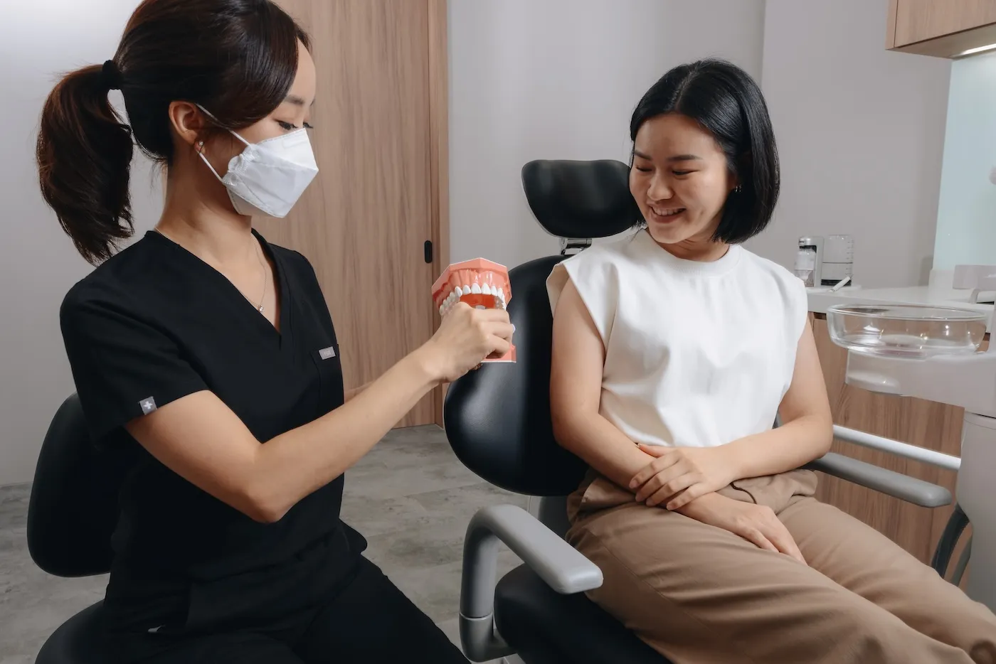 Smiling patient checking shade